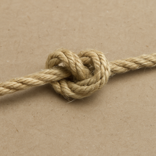 Rope knot pulled tight on a table