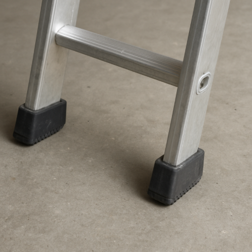Rubber feet on the bottom of a ladder resting on the floor