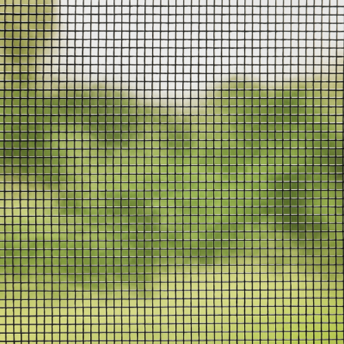 Close-up of fine mesh window screen with outdoor light behind it