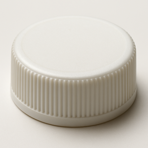 Close-up of a plastic bottle cap with ridged edges