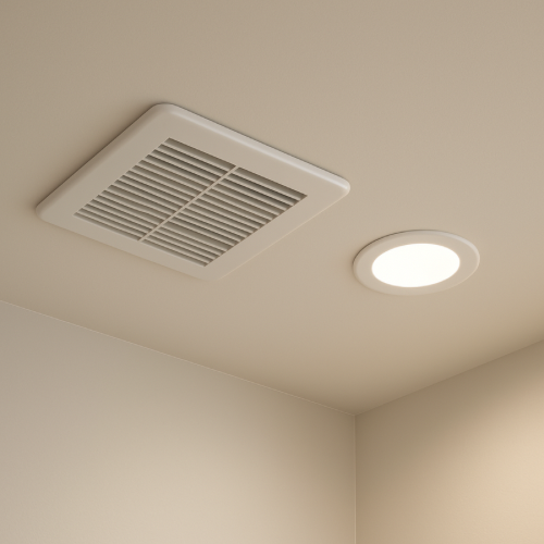 Bathroom ceiling exhaust fan installed near light fixture