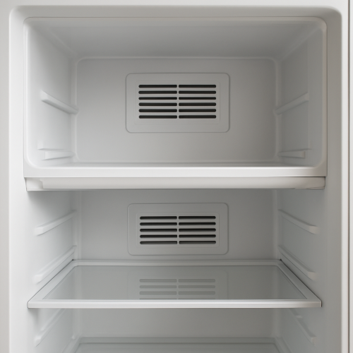 Interior of refrigerator showing air circulation vent